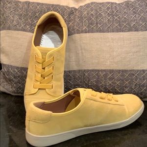Vionic yellow lace up sneakers.